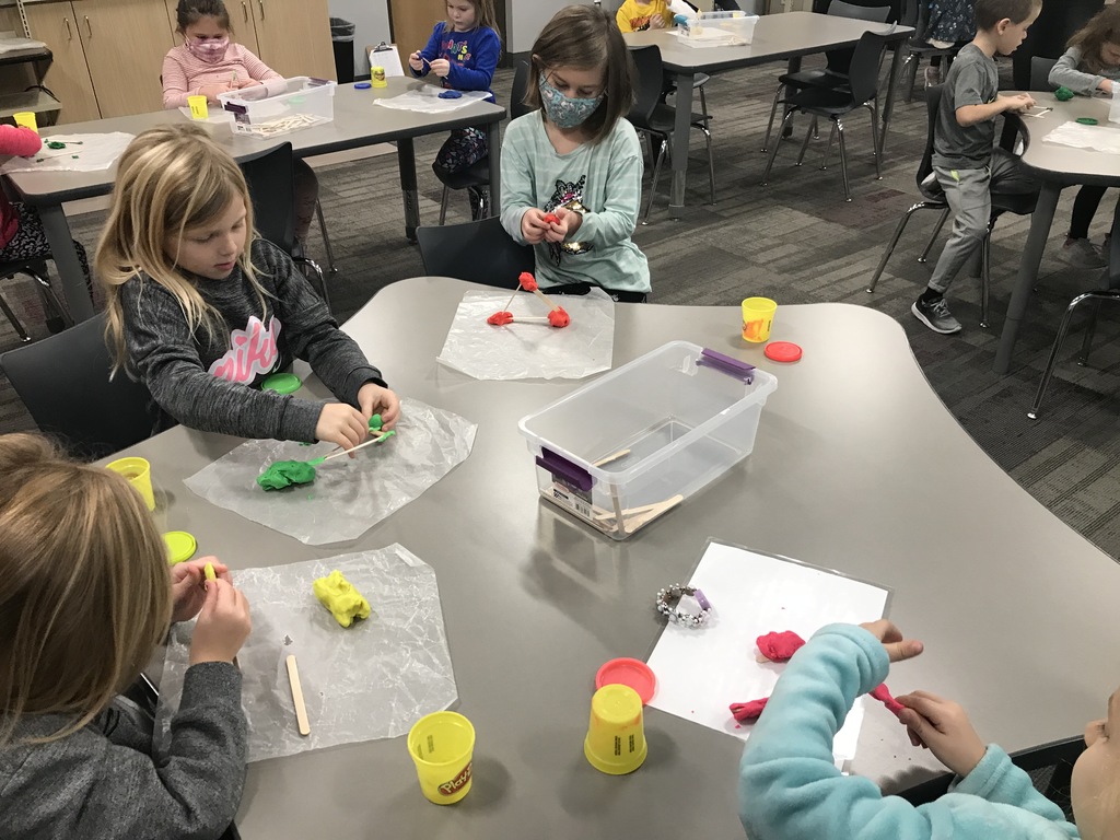Students shaping playdough