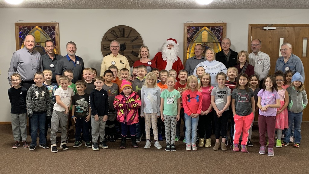 First graders, Rotarians and Santa