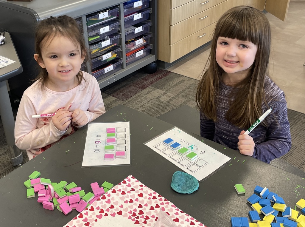 Two girls with math activity