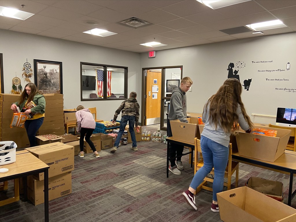 Students loading boxes.