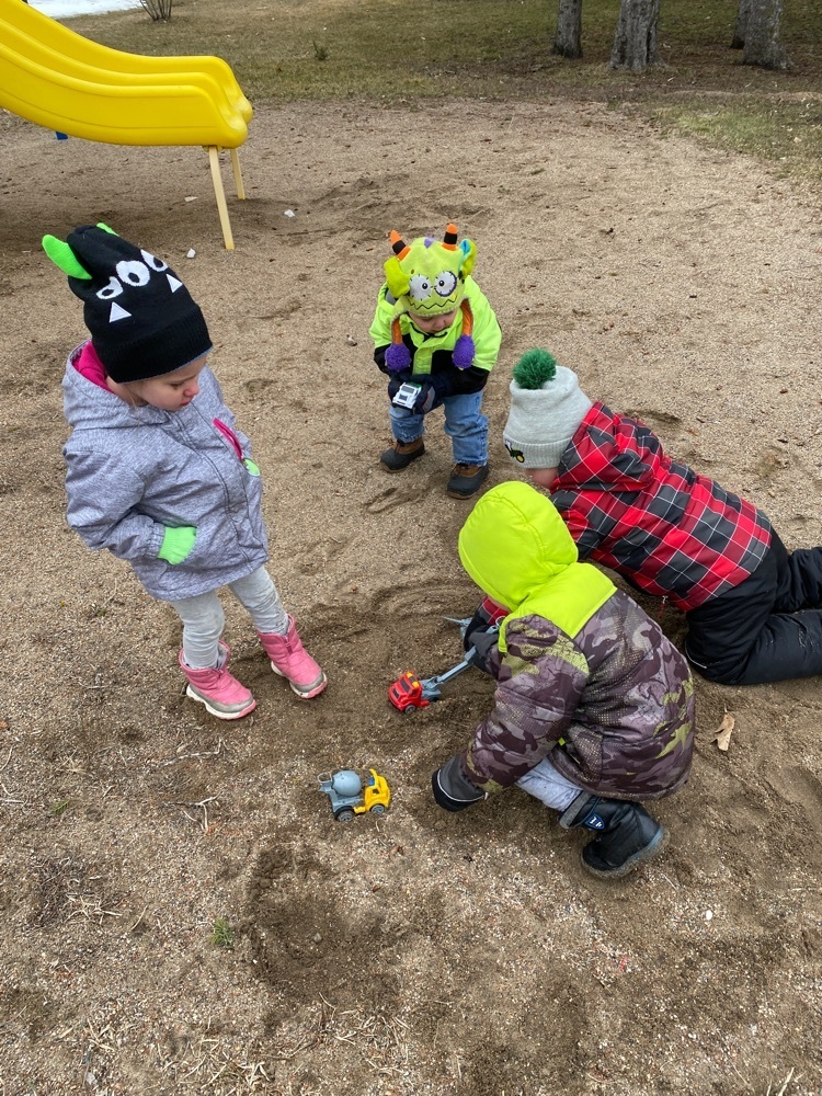 kids playing in the sand